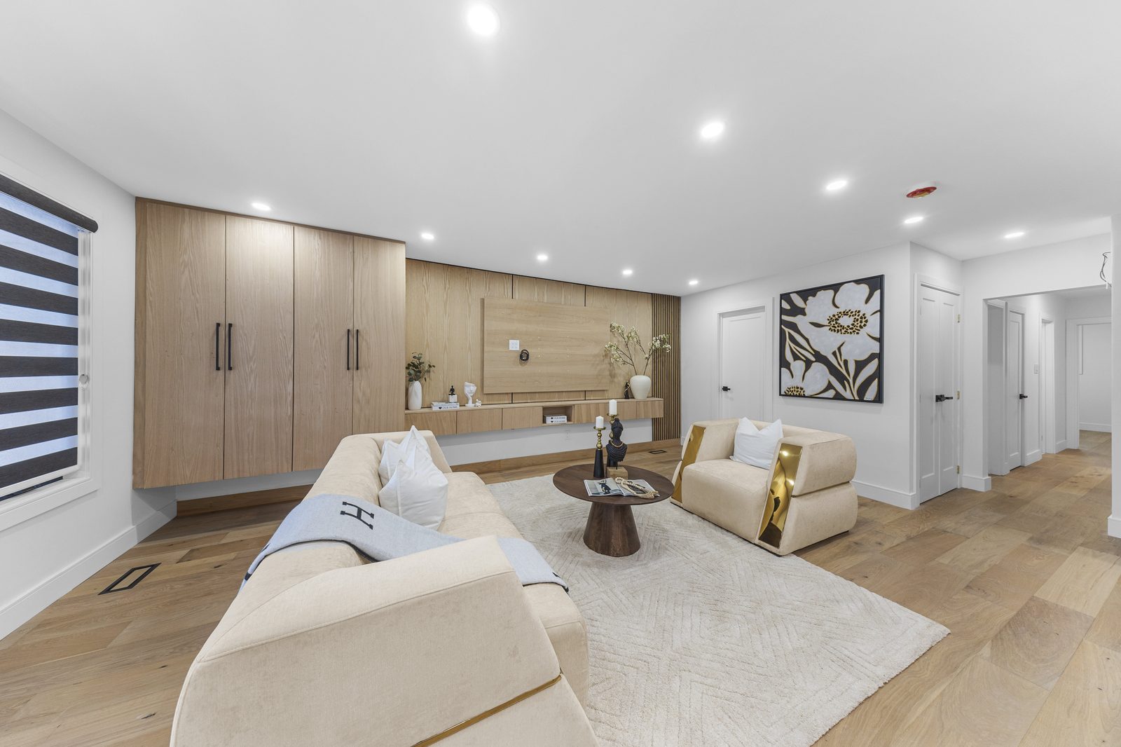 Basement recreation room with custom built-in cabinetry